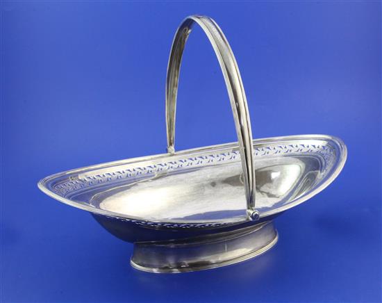 A George III silver cake basket by Samuel Godbehere, Edward Wigan & James Boult, 26 oz.